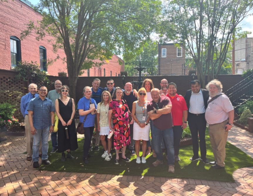 KSOB faculty & staff pose at Escape Central