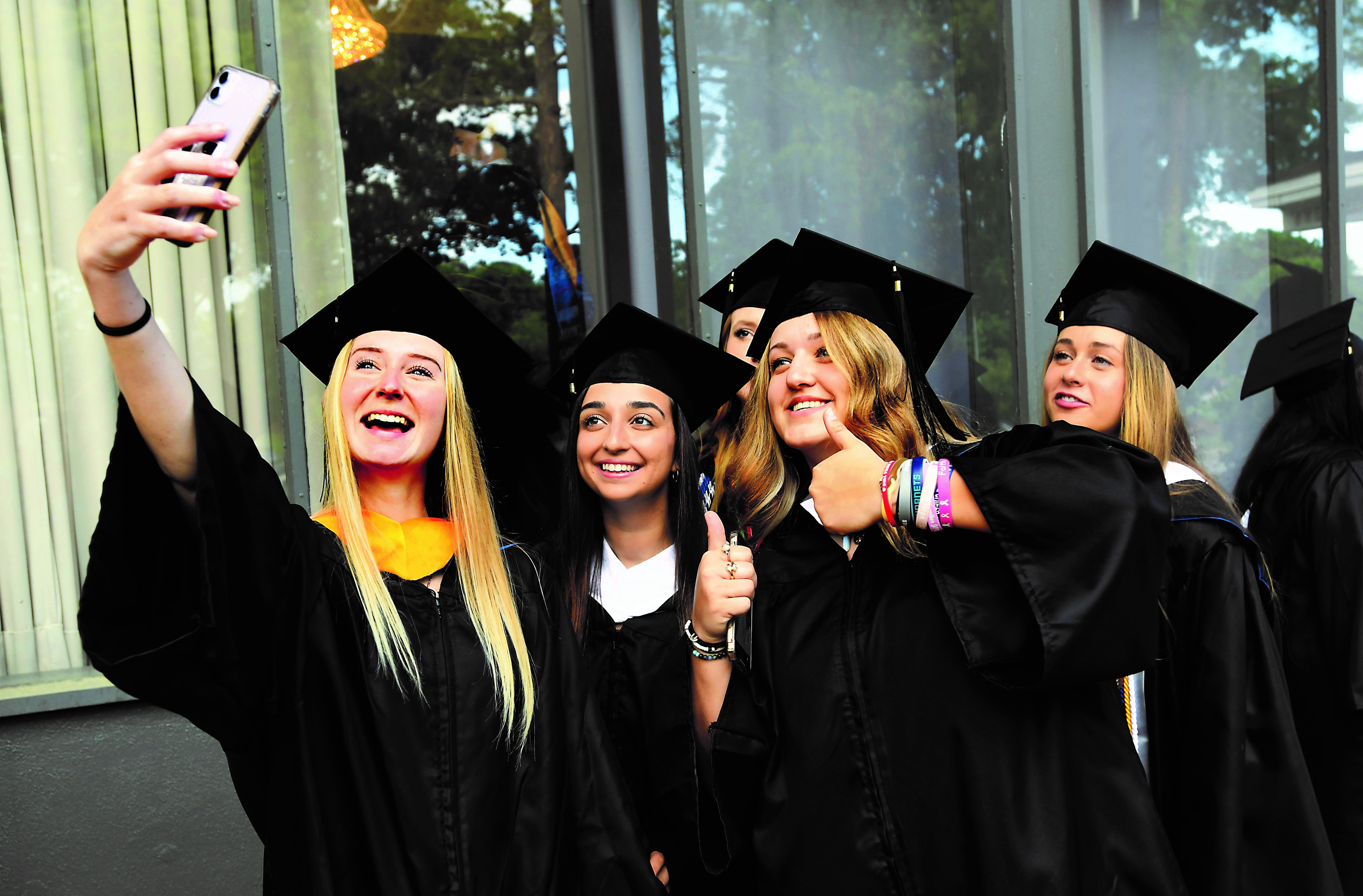 Catawba grads taking a selfie