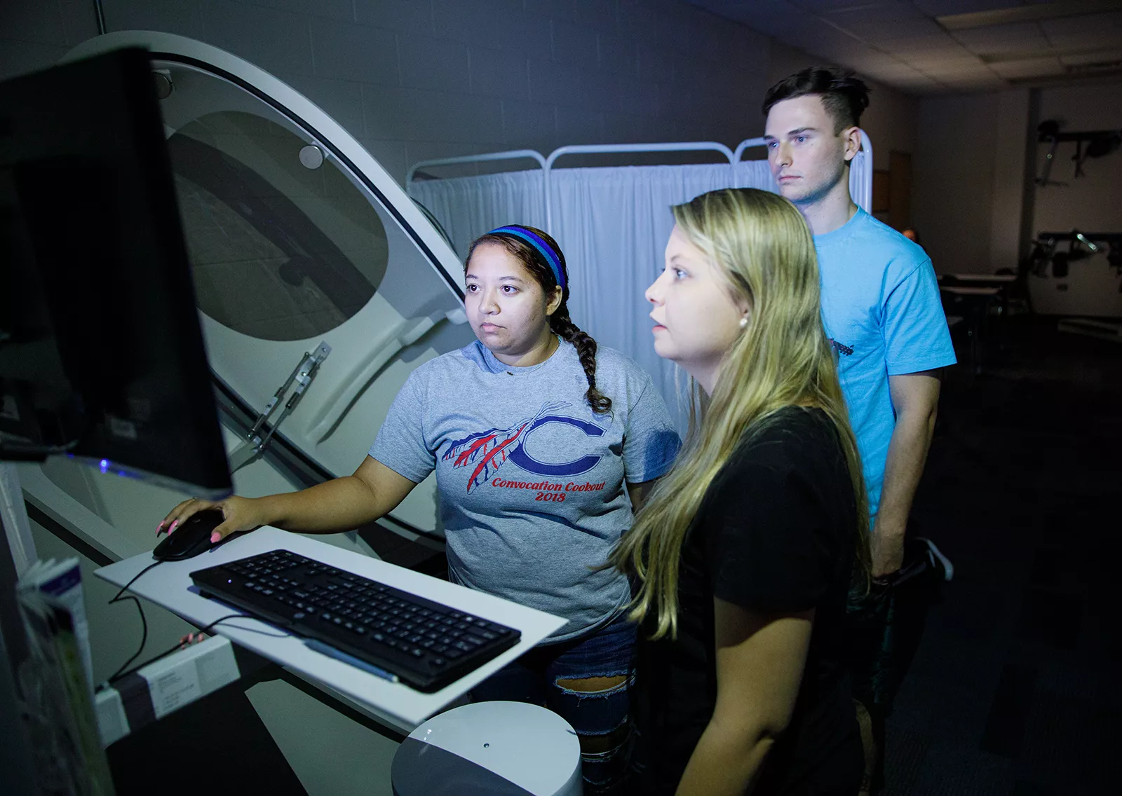 Students in Exercise science using bod pod