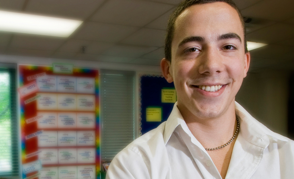 Teacher Education student smiling in classroom