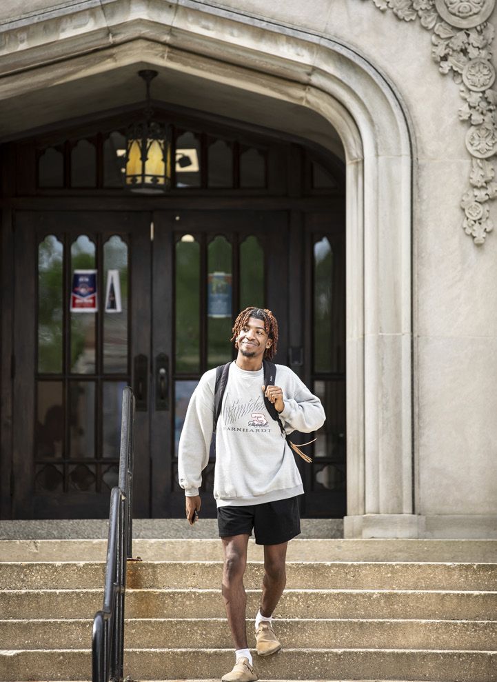 Student exiting Shuford Science Building